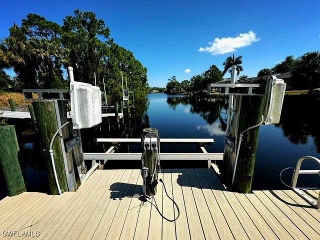 dock area featuring a water view