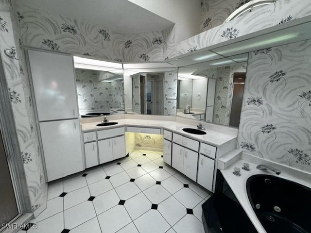 bathroom with vanity and a bathtub