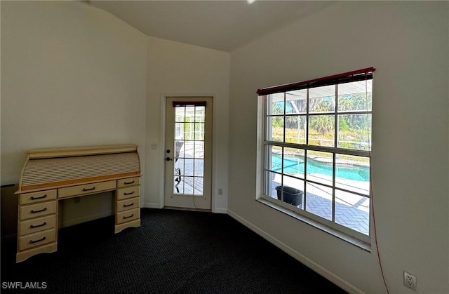 unfurnished office featuring dark colored carpet