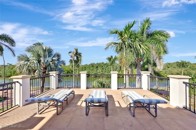 view of patio featuring a water view