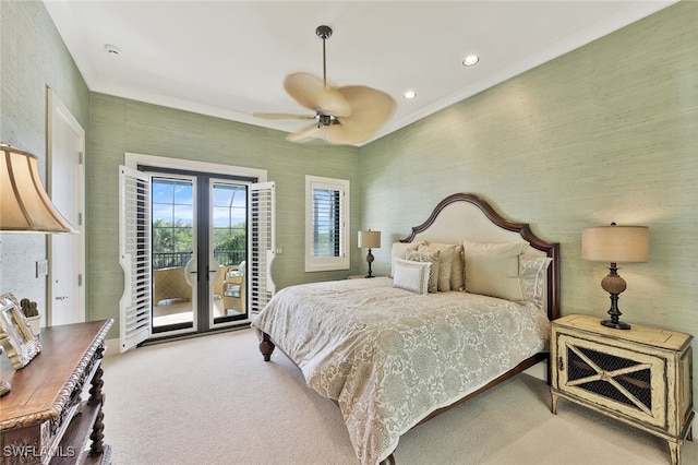 bedroom featuring ceiling fan, access to exterior, and carpet floors