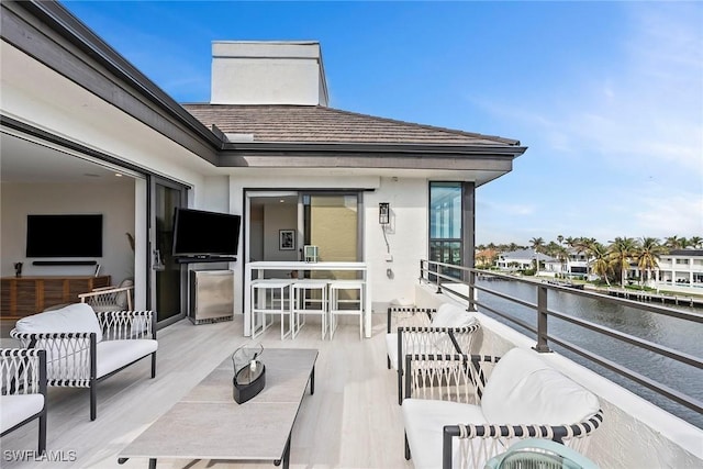 view of patio / terrace with a balcony