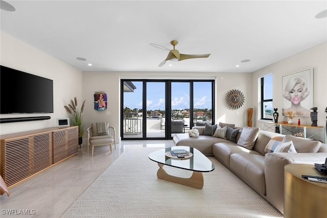 living room featuring ceiling fan