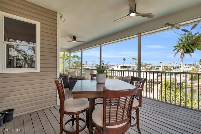 sunroom / solarium with ceiling fan