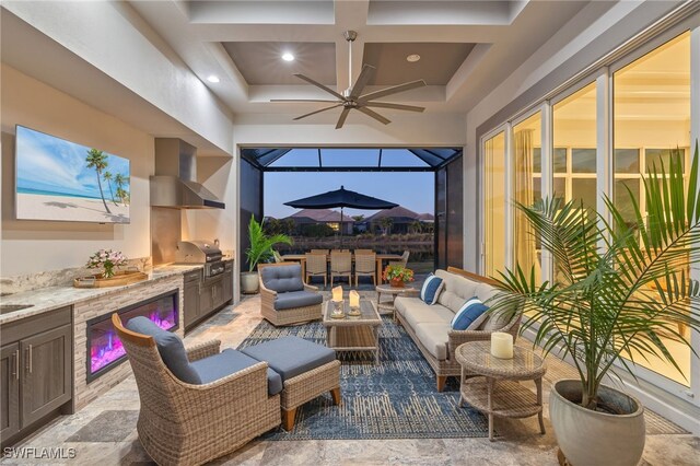 interior space with ceiling fan, area for grilling, a grill, and an outdoor hangout area