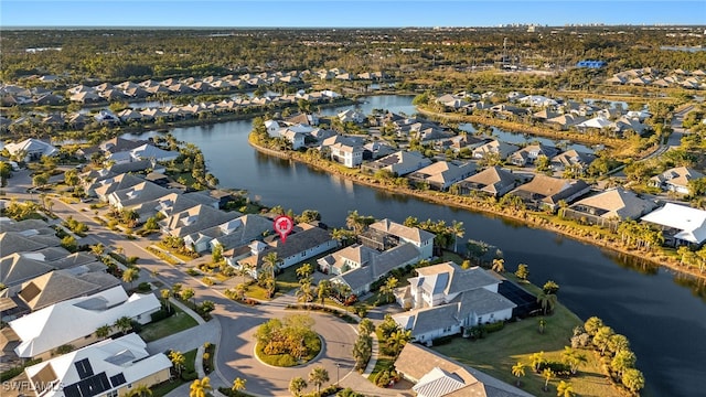 drone / aerial view with a water view