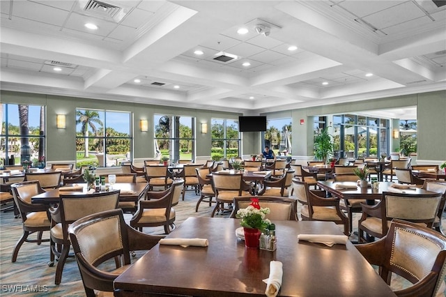 dining area with coffered ceiling, visible vents, and beamed ceiling