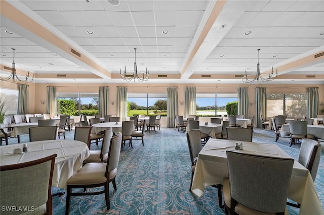 dining room with plenty of natural light, visible vents, and a notable chandelier