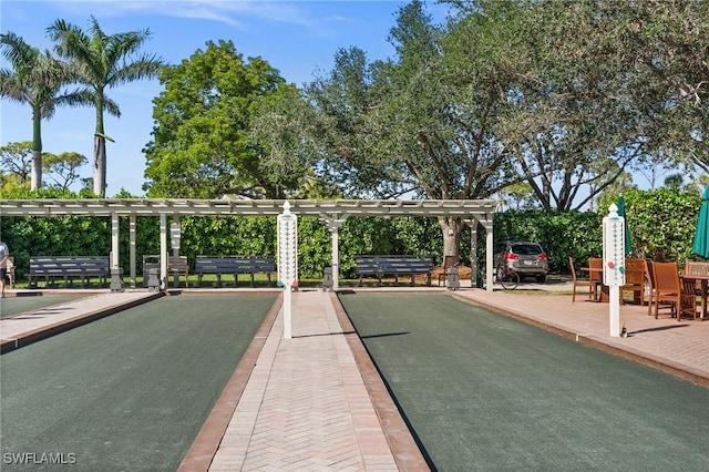 view of property's community with a pergola