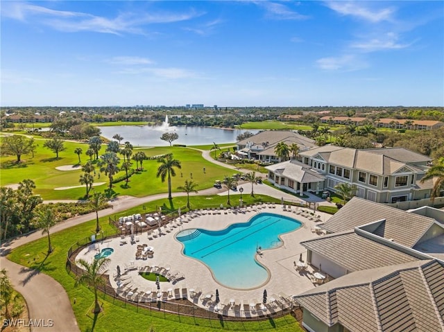 pool featuring a patio area, golf course view, and a water view