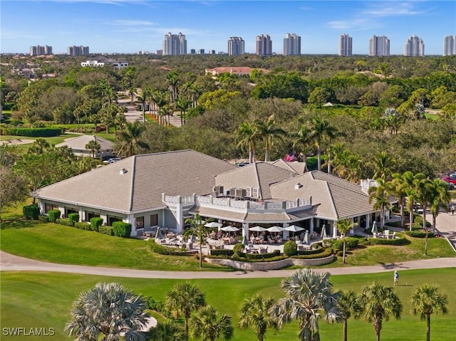 birds eye view of property with a view of city