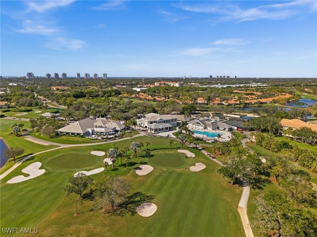 bird's eye view with golf course view and a water view