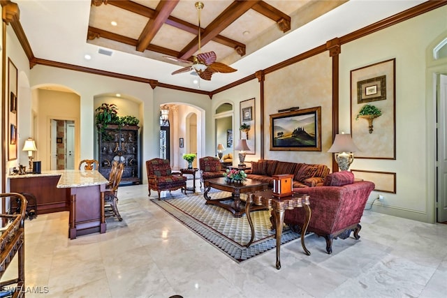 living room featuring ceiling fan, a high ceiling, coffered ceiling, beamed ceiling, and ornamental molding