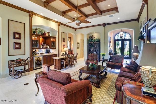 living room featuring french doors, coffered ceiling, ceiling fan, beam ceiling, and beverage cooler