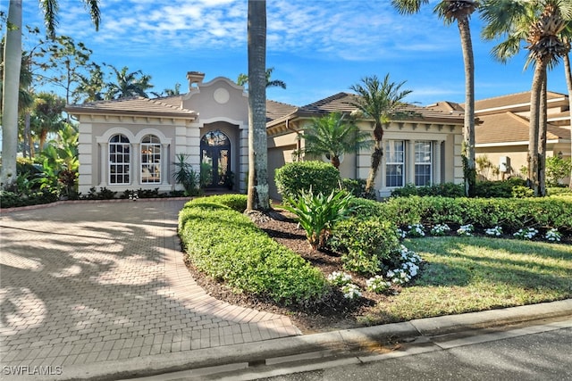 view of front of property with a front lawn