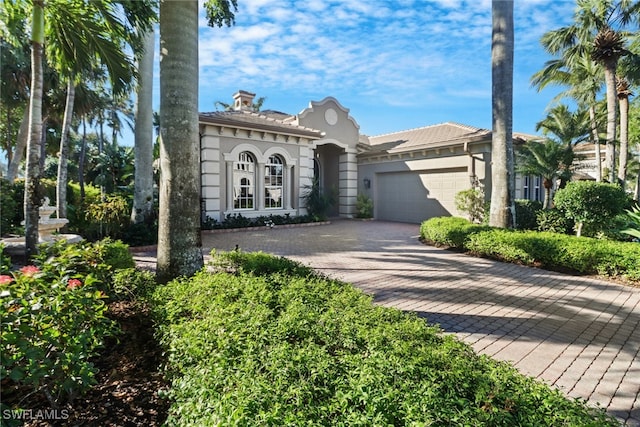 view of front of home with a garage