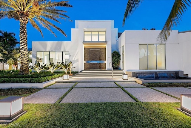 exterior space with stucco siding