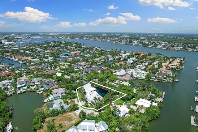 drone / aerial view with a water view