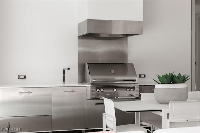 kitchen with light countertops and a sink