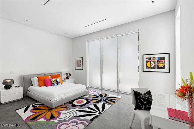 bedroom with concrete floors