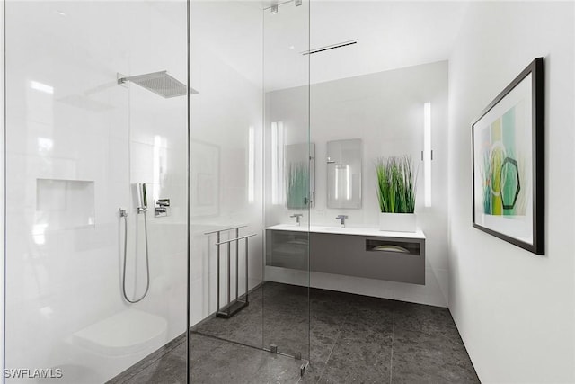 full bath featuring a walk in shower and vanity
