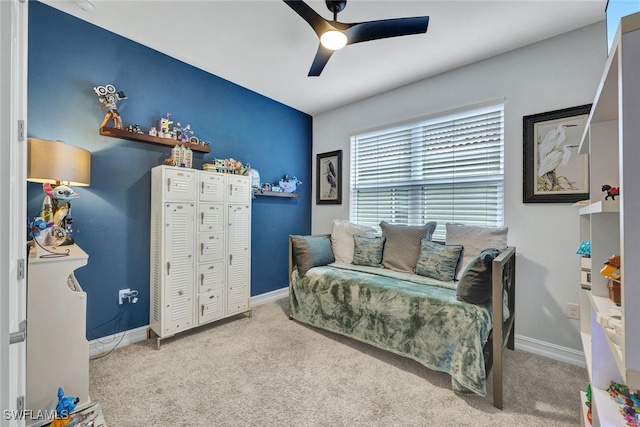 bedroom featuring ceiling fan and carpet flooring