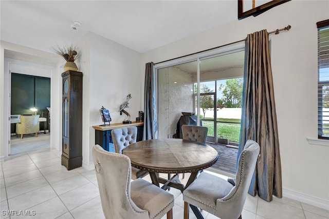 dining space with light tile patterned floors