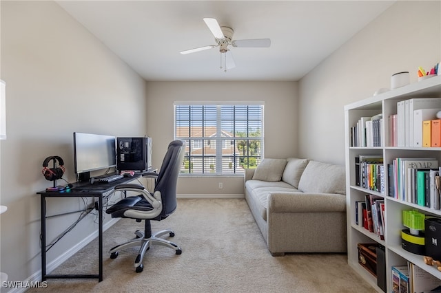 office with light carpet and ceiling fan