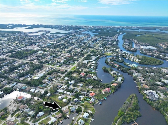 bird's eye view with a water view