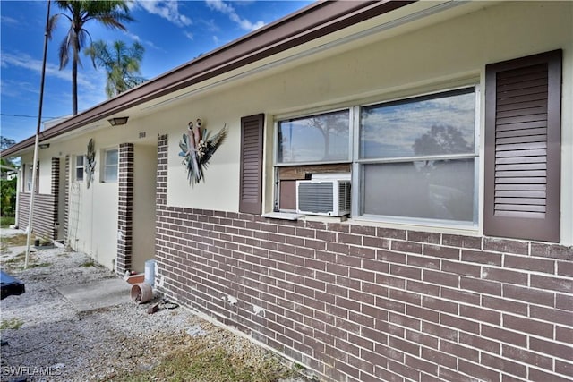 view of home's exterior featuring cooling unit