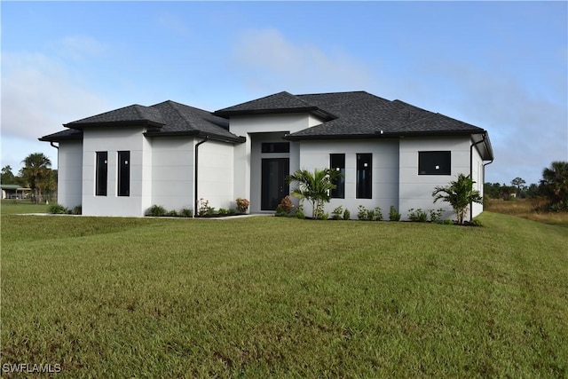 view of front facade with a front lawn