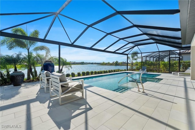 view of pool with a lanai, a patio area, and a water view