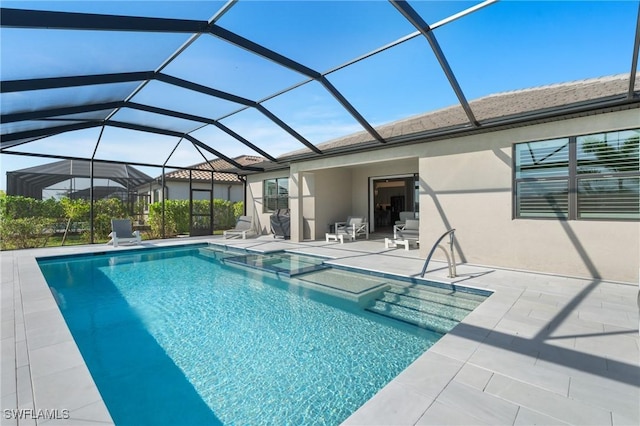 view of swimming pool with a lanai and a patio