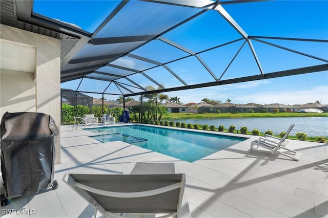 view of swimming pool with a lanai, a grill, a water view, and a patio