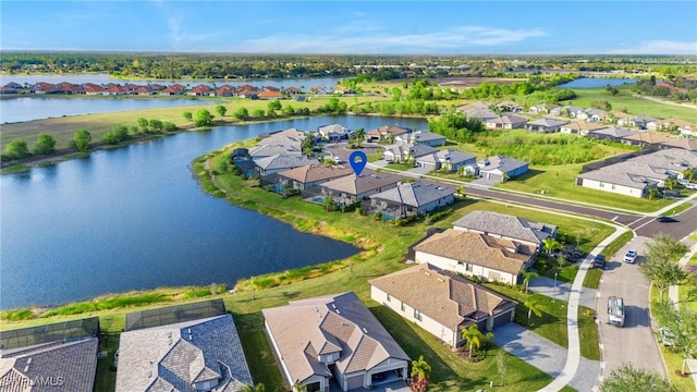 drone / aerial view featuring a water view