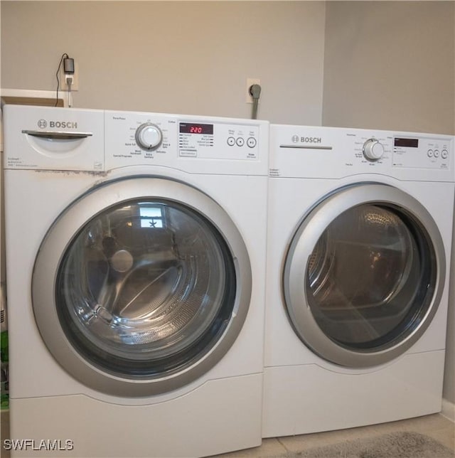 laundry area with washer and dryer