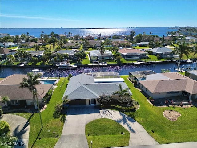 bird's eye view with a water view