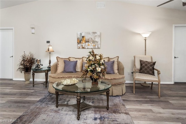 sitting room featuring ceiling fan and hardwood / wood-style floors