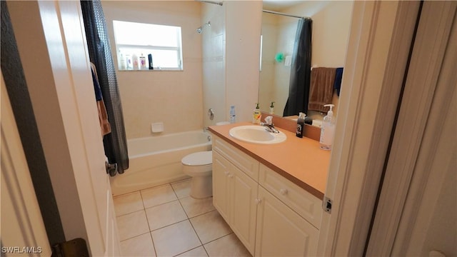 full bathroom with tile patterned floors, vanity, shower / bath combination with curtain, and toilet