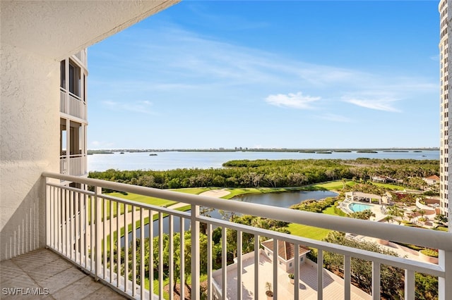 balcony featuring a water view