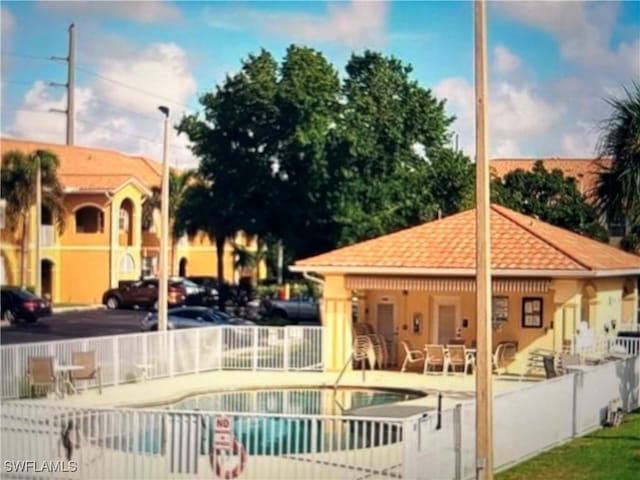 view of swimming pool featuring a patio area