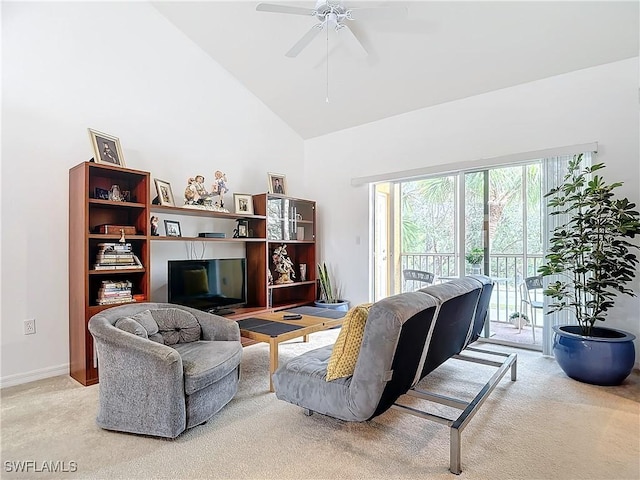 living room featuring light carpet, high vaulted ceiling, and ceiling fan