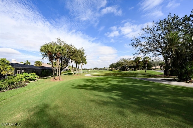 surrounding community featuring a lawn