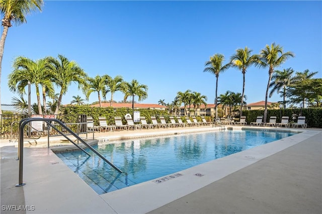 view of swimming pool featuring a patio area