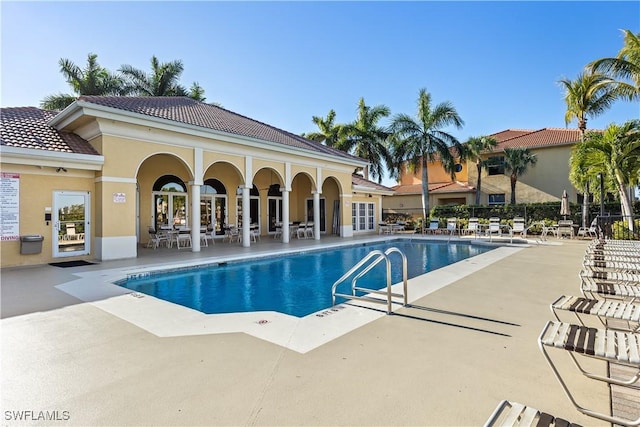 view of pool featuring a patio area