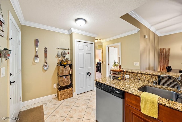 kitchen with light tile patterned floors, dishwasher, ornamental molding, and sink