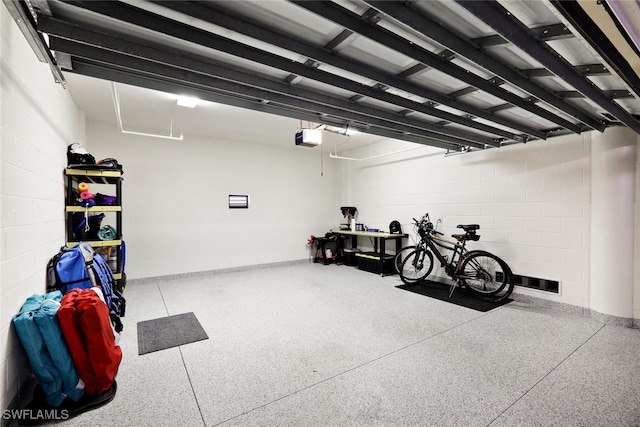 garage featuring a garage door opener