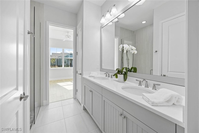 bathroom with tile patterned floors and vanity