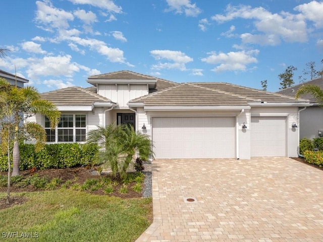 view of front of property with a garage