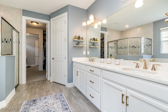 bathroom featuring vanity and walk in shower